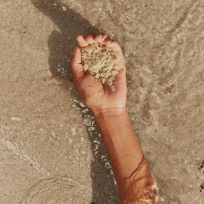 HigherDOSE serotonin soak in a woman's hand on nanaka.co