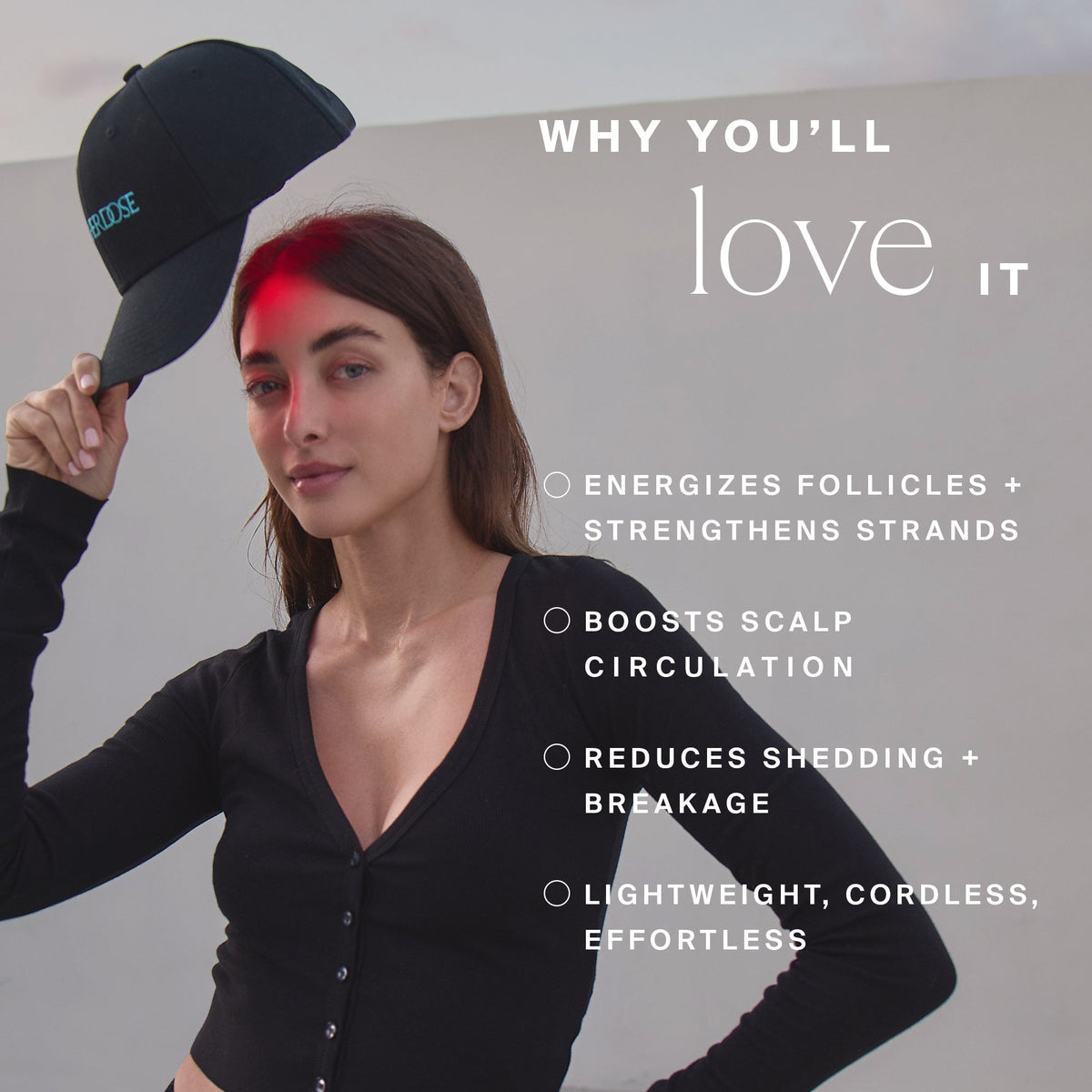 Woman with long dark hair wearing the HigherDOSE Red Light Hat with a red glow on her forehead and its benefits listed