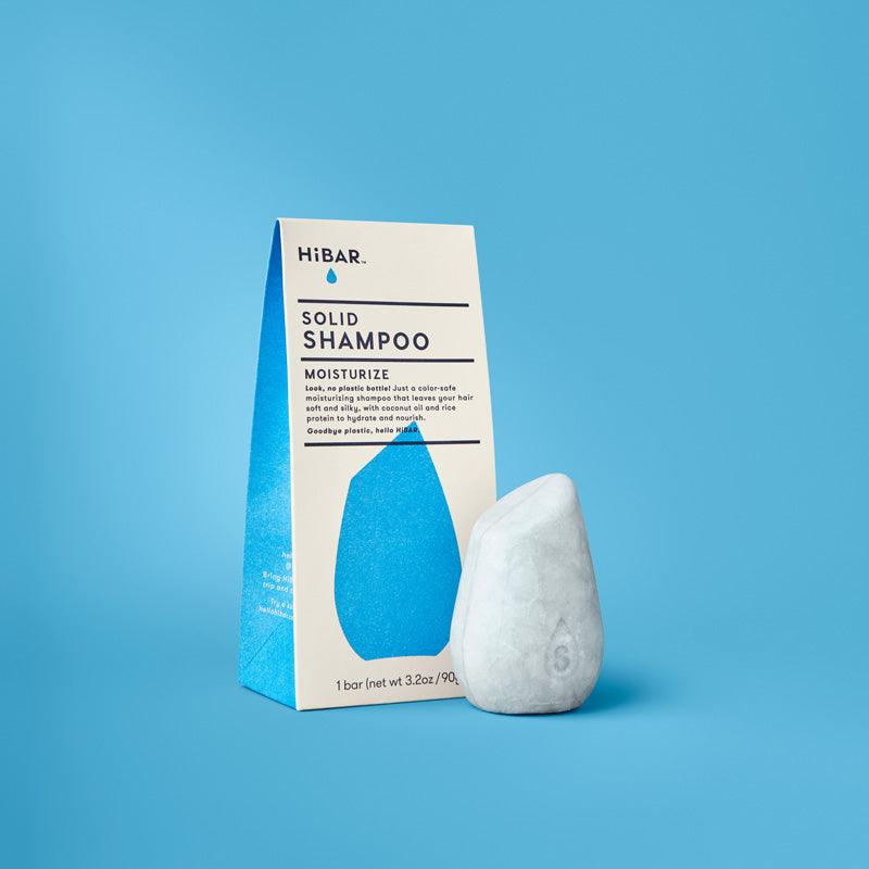 HiBAR Moisturize Shampoo Bar box with a blue shampoo bar on a blue background