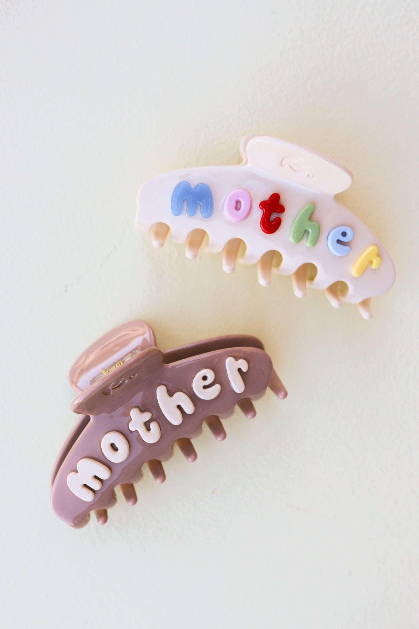 MOTHERHOOD CLAW