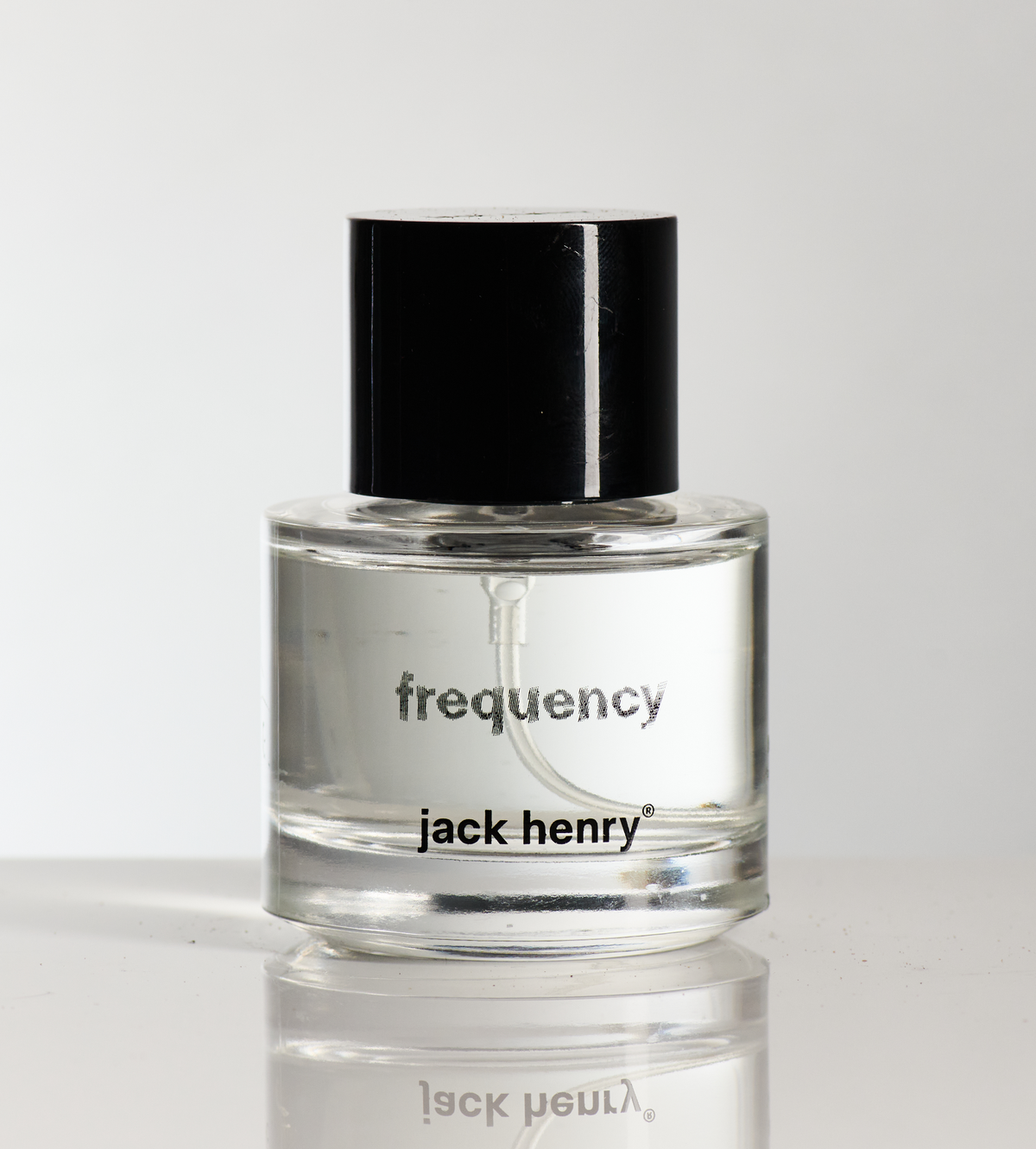 Jack Henry Frequency eau de parfum bottle on a gray background