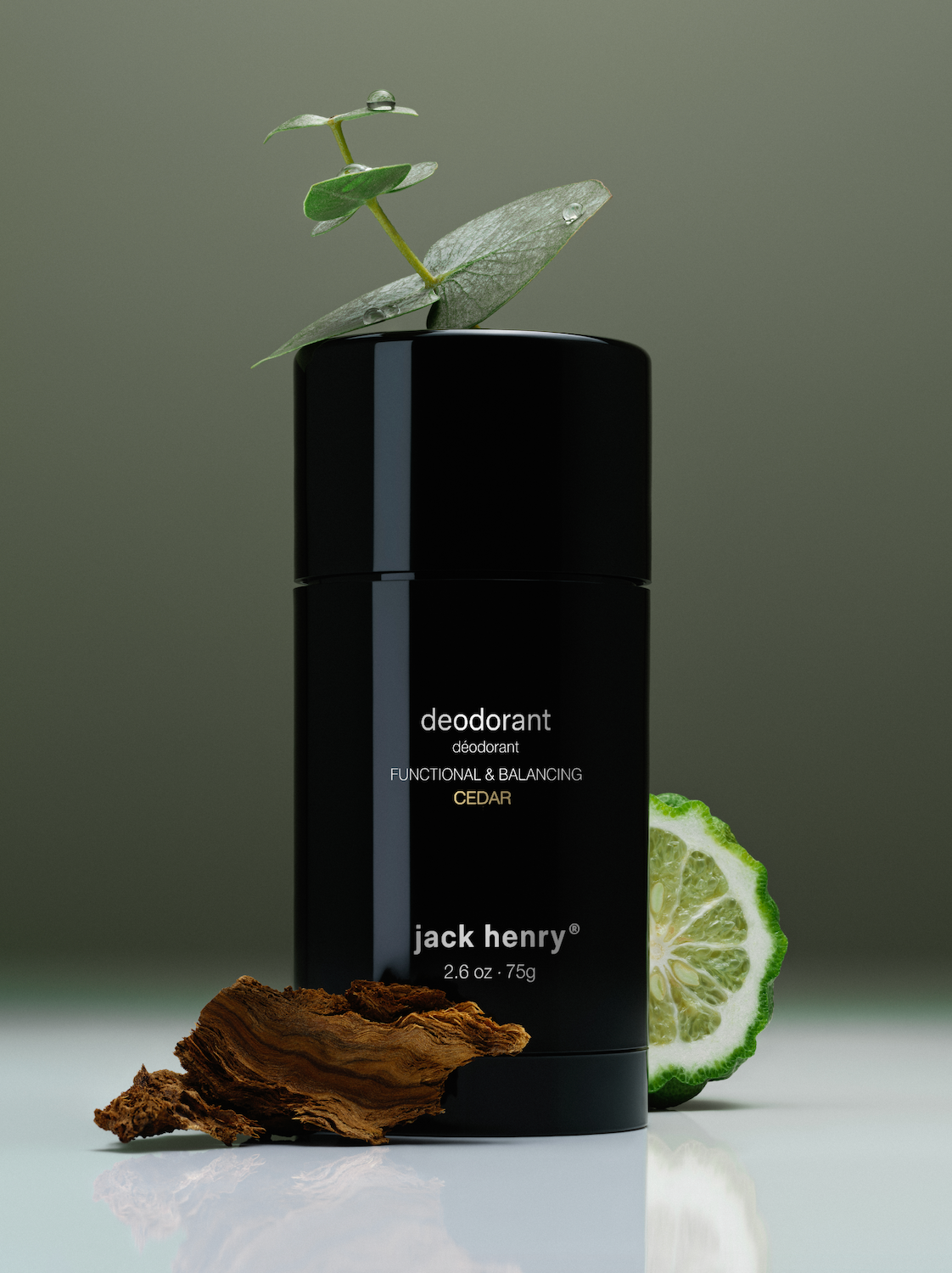 Jack Henry Deodorant in Cedar with eucalyptus leaves and a bergamot slice