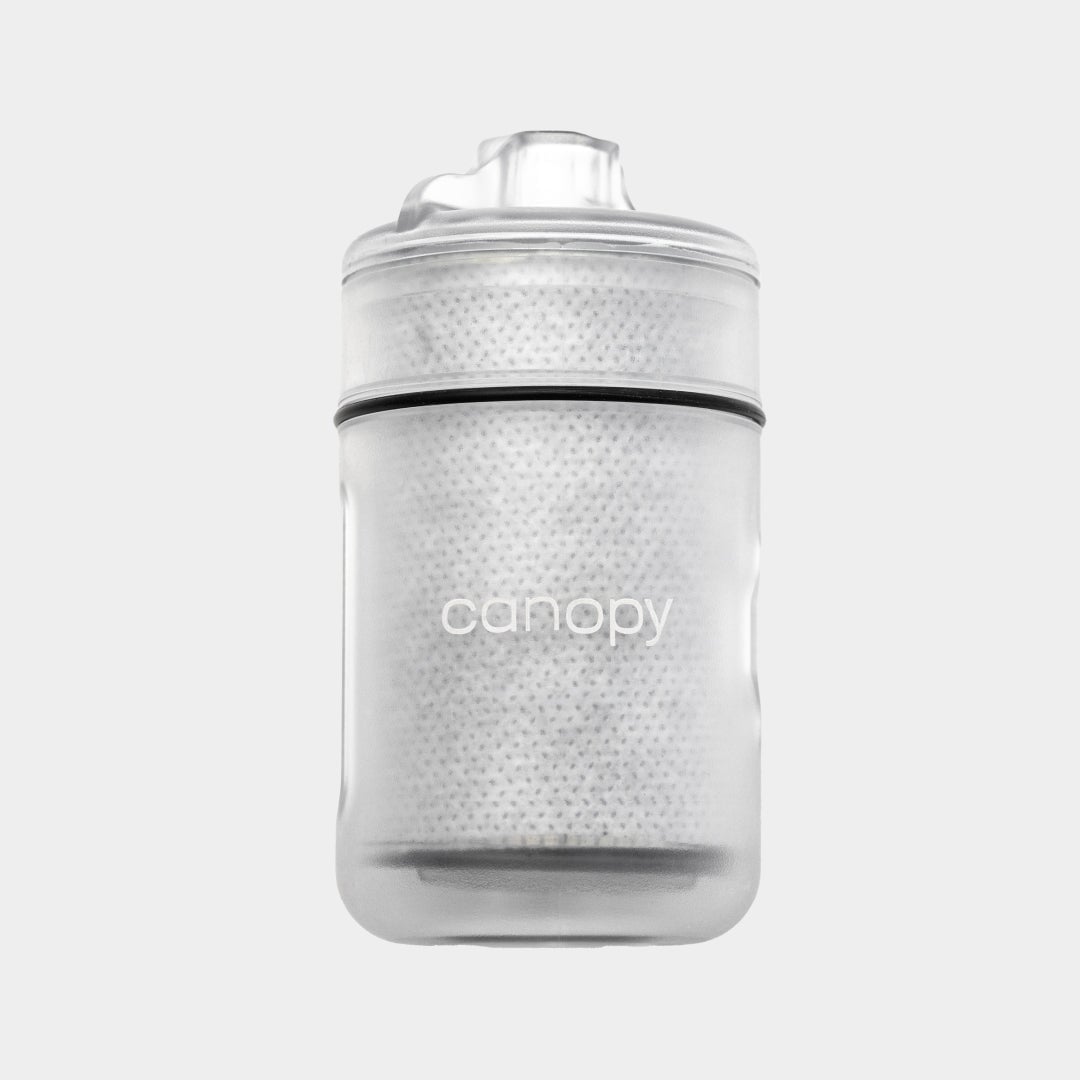 Canopy Faucet Filter Cartridge on a light gray background
