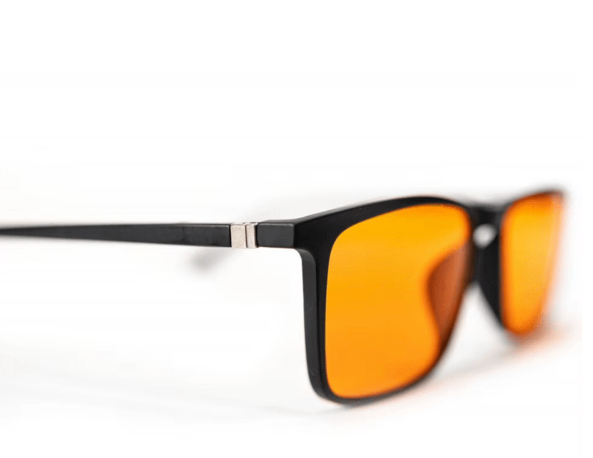 Close-up side view of DreamWalkerz Men in Black Nighttime glasses with orange lenses
