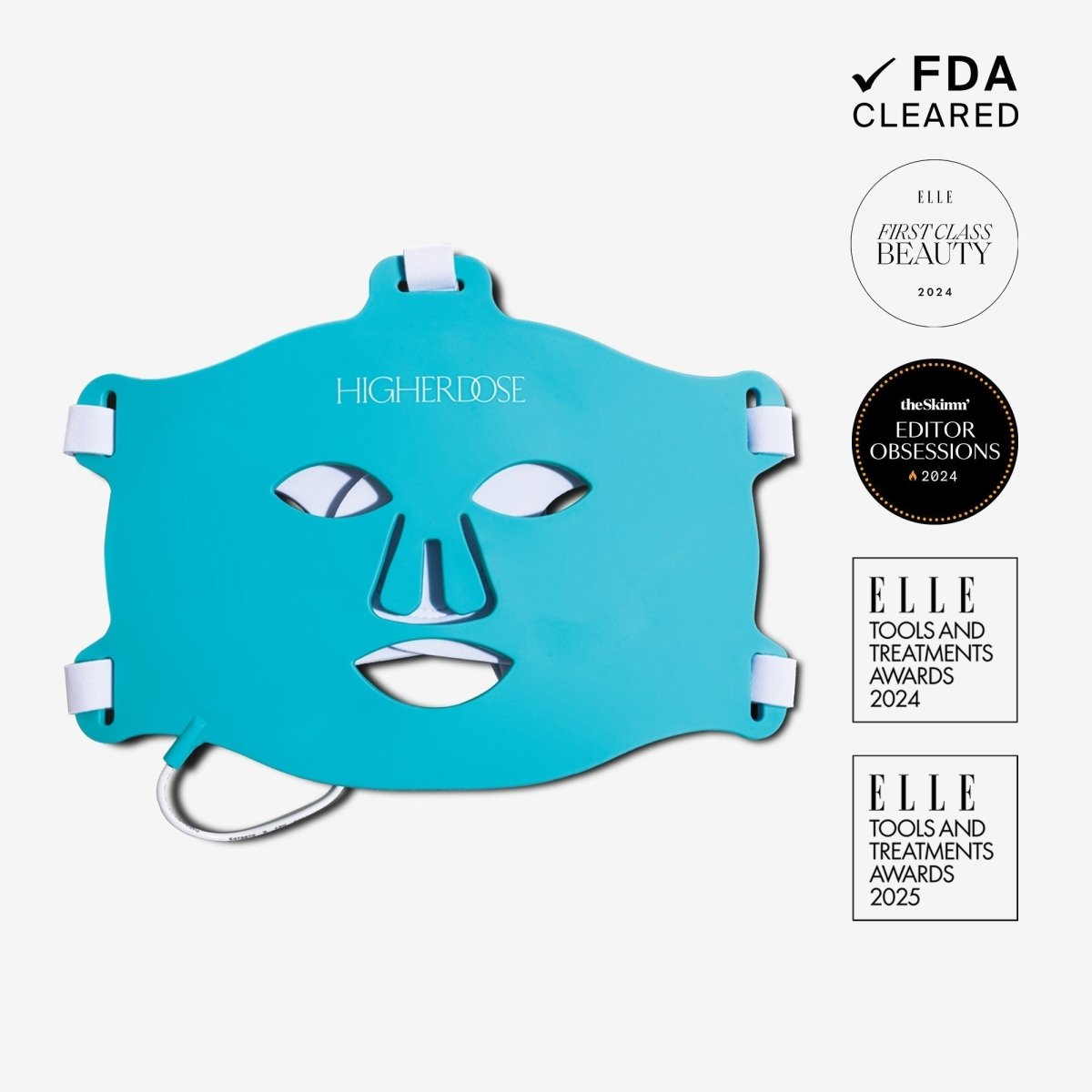 HigherDOSE Red Light Face Mask in teal silicone with white straps and award badges: FDA cleared, ELLE, The Skimm and others