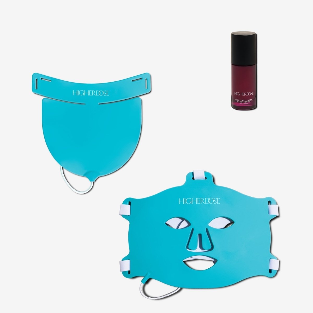 HigherDOSE Red Light Face Mask and Neck Enhancer in teal beside the Light-Activated Glow Serum bottle on white