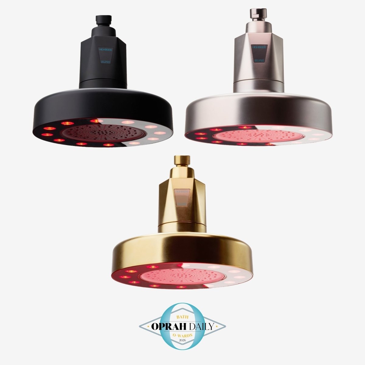 Three HigherDOSE Red Light Showerhead Filters in black, silver and gold with an Oprah Daily badge