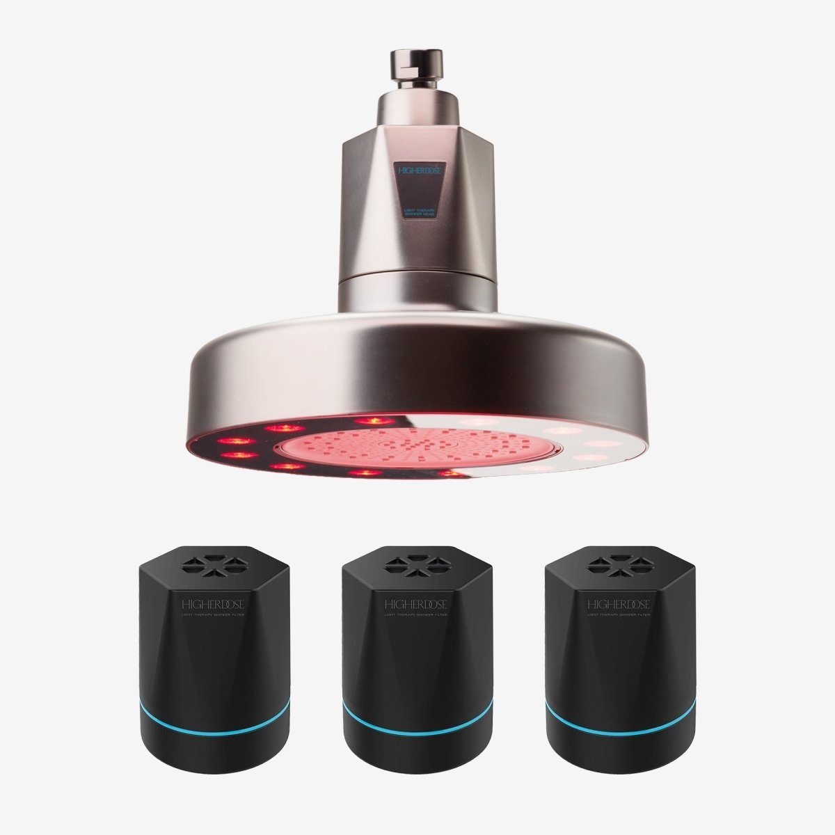 Silver HigherDOSE Red Light Showerhead Filter with three replacement filter cartridges on white