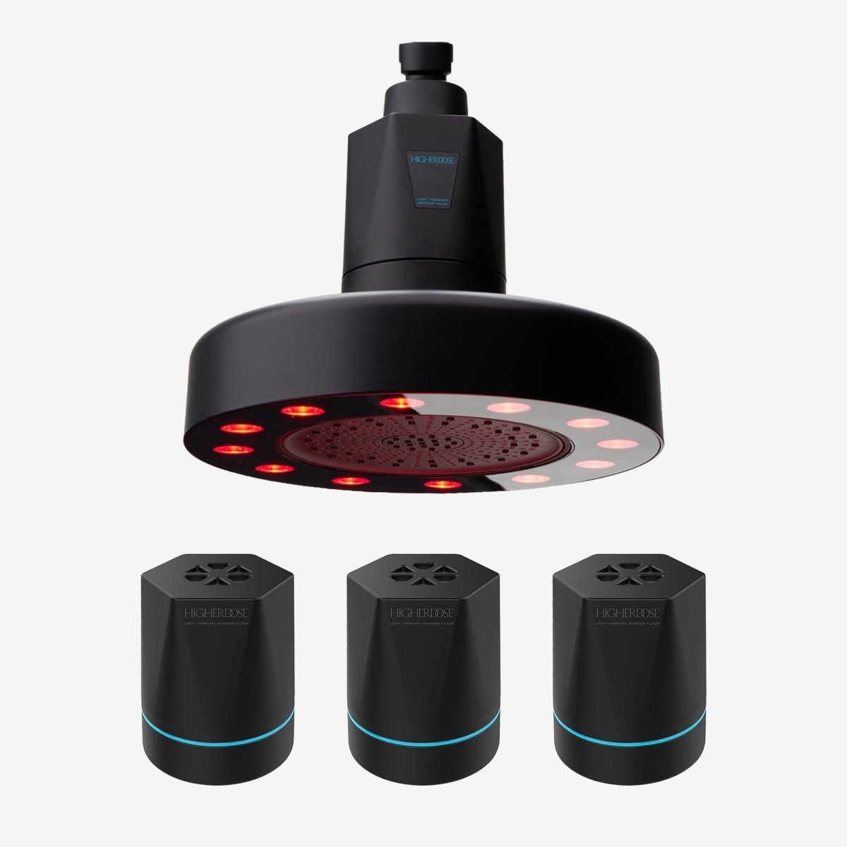 Black HigherDOSE Red Light Showerhead Filter with three replacement filter cartridges on white
