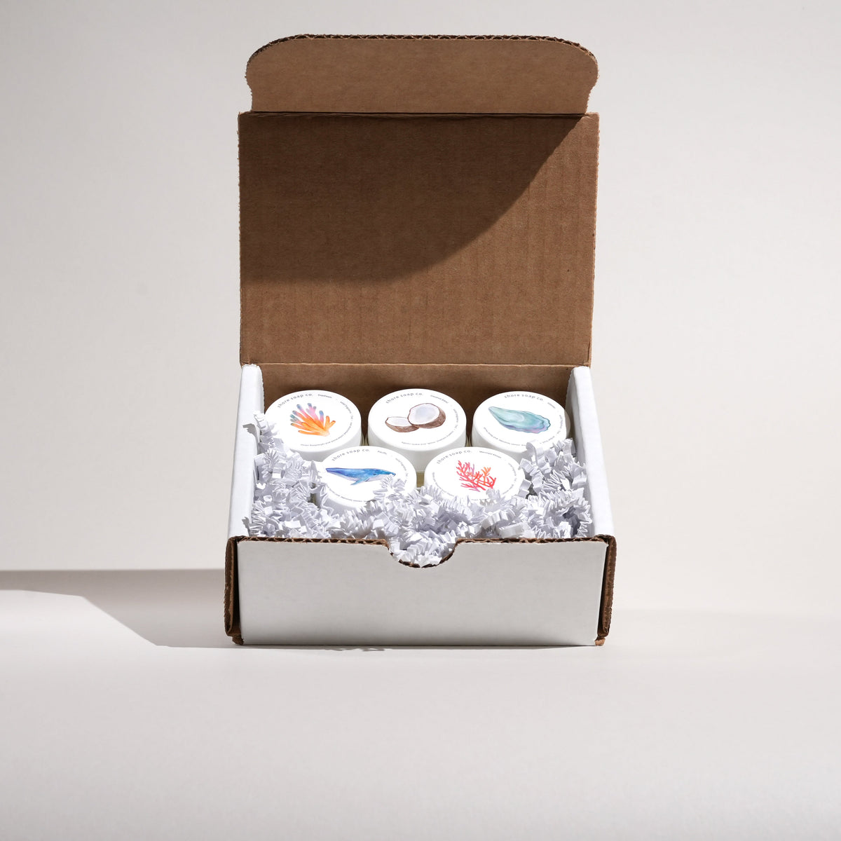 Shore Soap Co. Open Scent Sample Pack box holding six sample jars in tissue