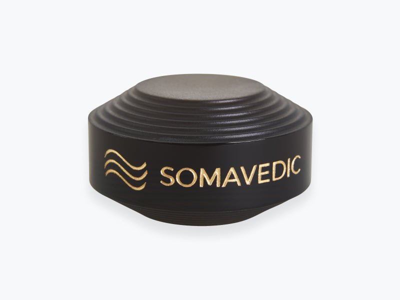 Somavedic Tiny in black with a gold logo on white