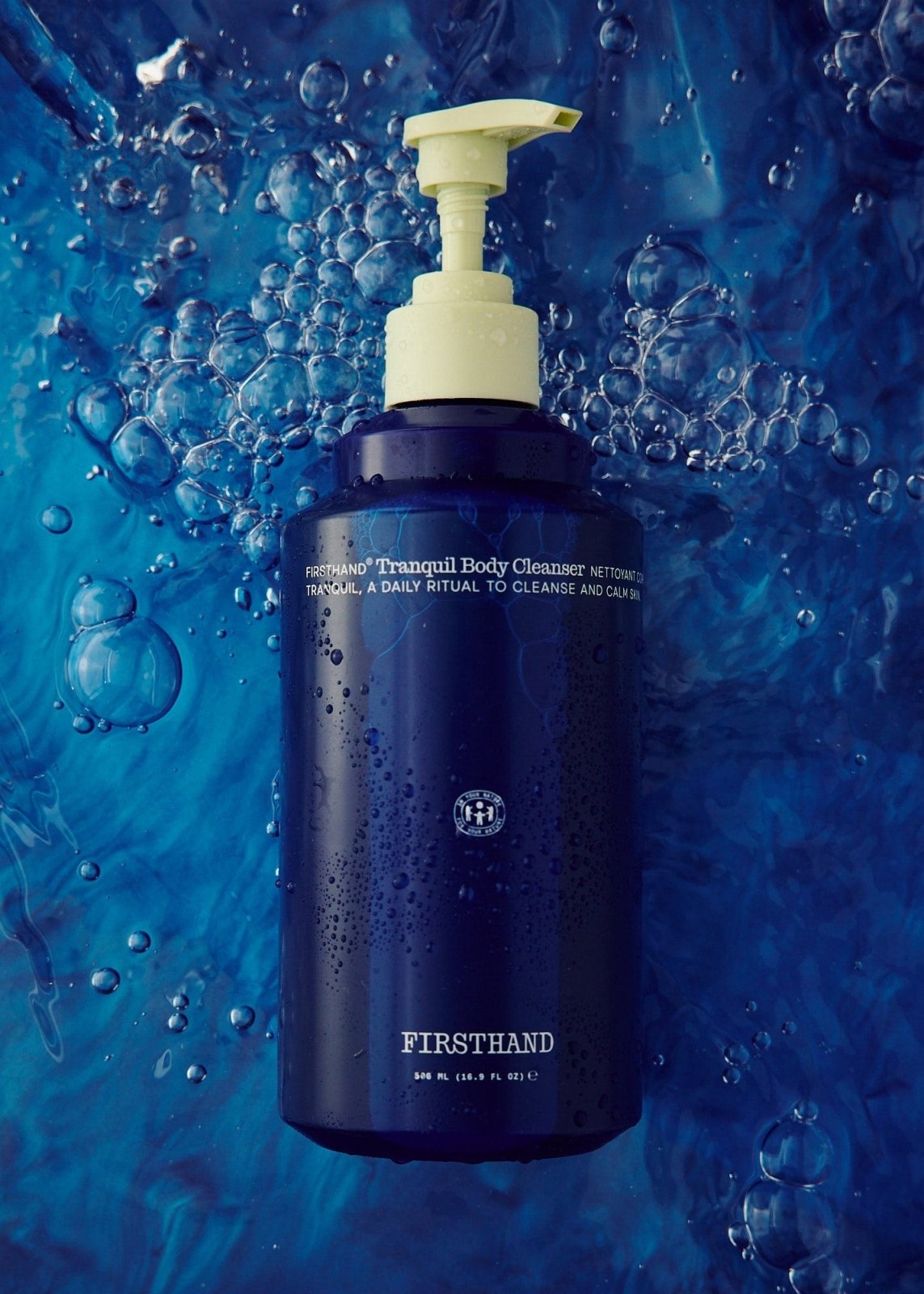 Man with styled hair using Firsthand Supply grooming products
