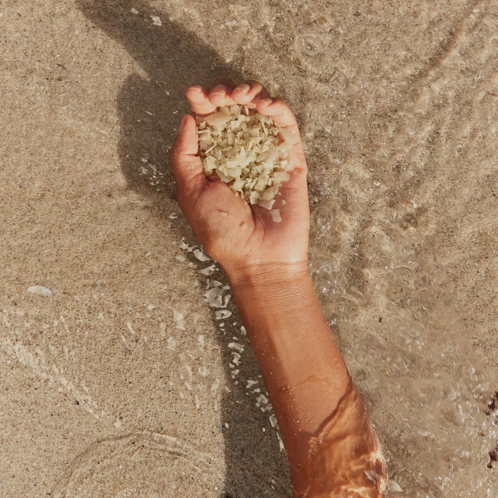 HigherDOSE serotonin soak in a woman's hand on nanaka.co