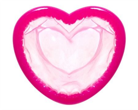 Heart shaped magenta condom for blog post on nanaka.co