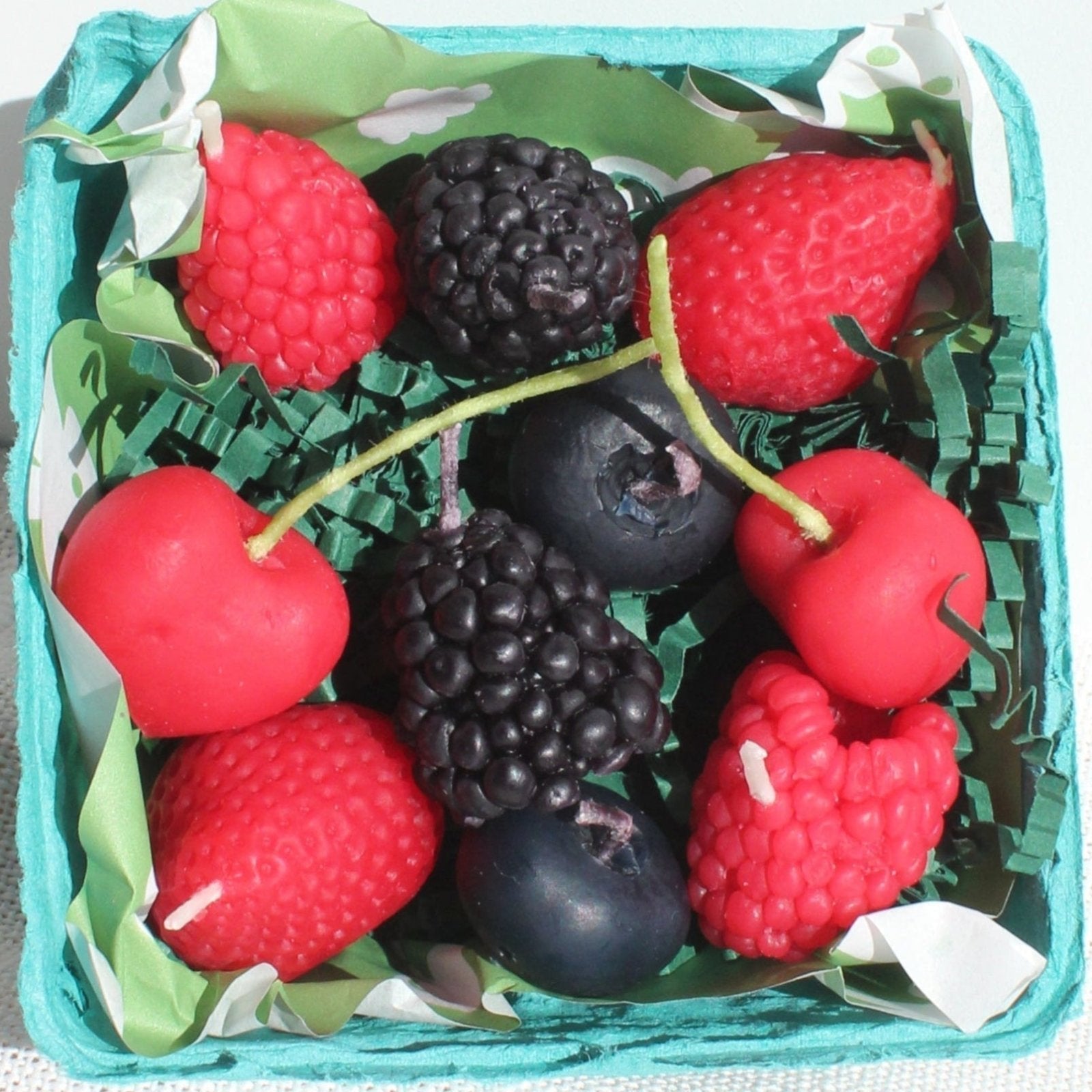 Happy Organics beeswax mixed berry birthday candles handmade in Los Angeles by a California beekeeping family
