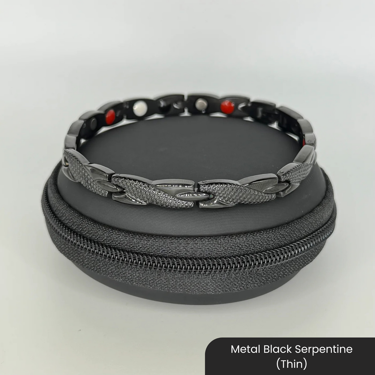 Therasage Bio Band metal bracelet in Metal Black Serpentine (Thin) on a black zip case