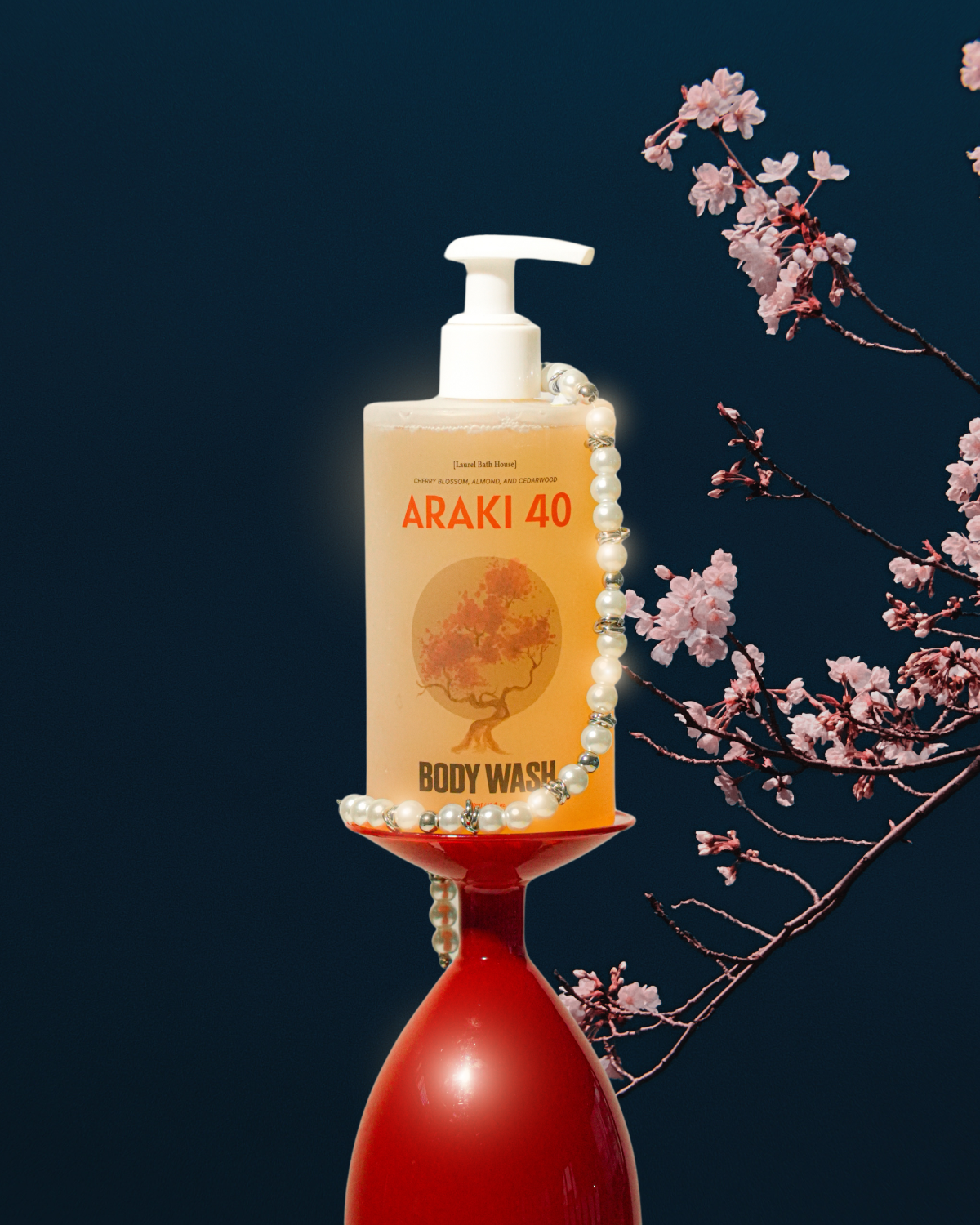 Body wash bottle labeled 'Araki 40' with cherry blossoms on a dark background