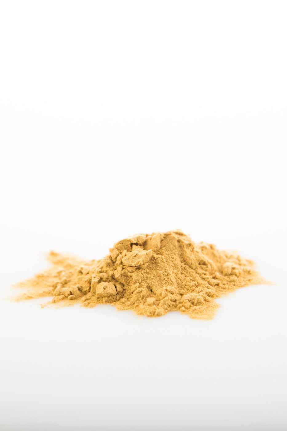 Pile of Sun Potion Astragalus powder in golden tan