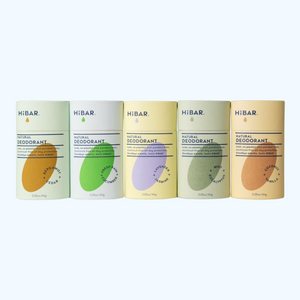 Five HiBAR Plastic-Free Deodorant sticks in different scents lined up on a white background