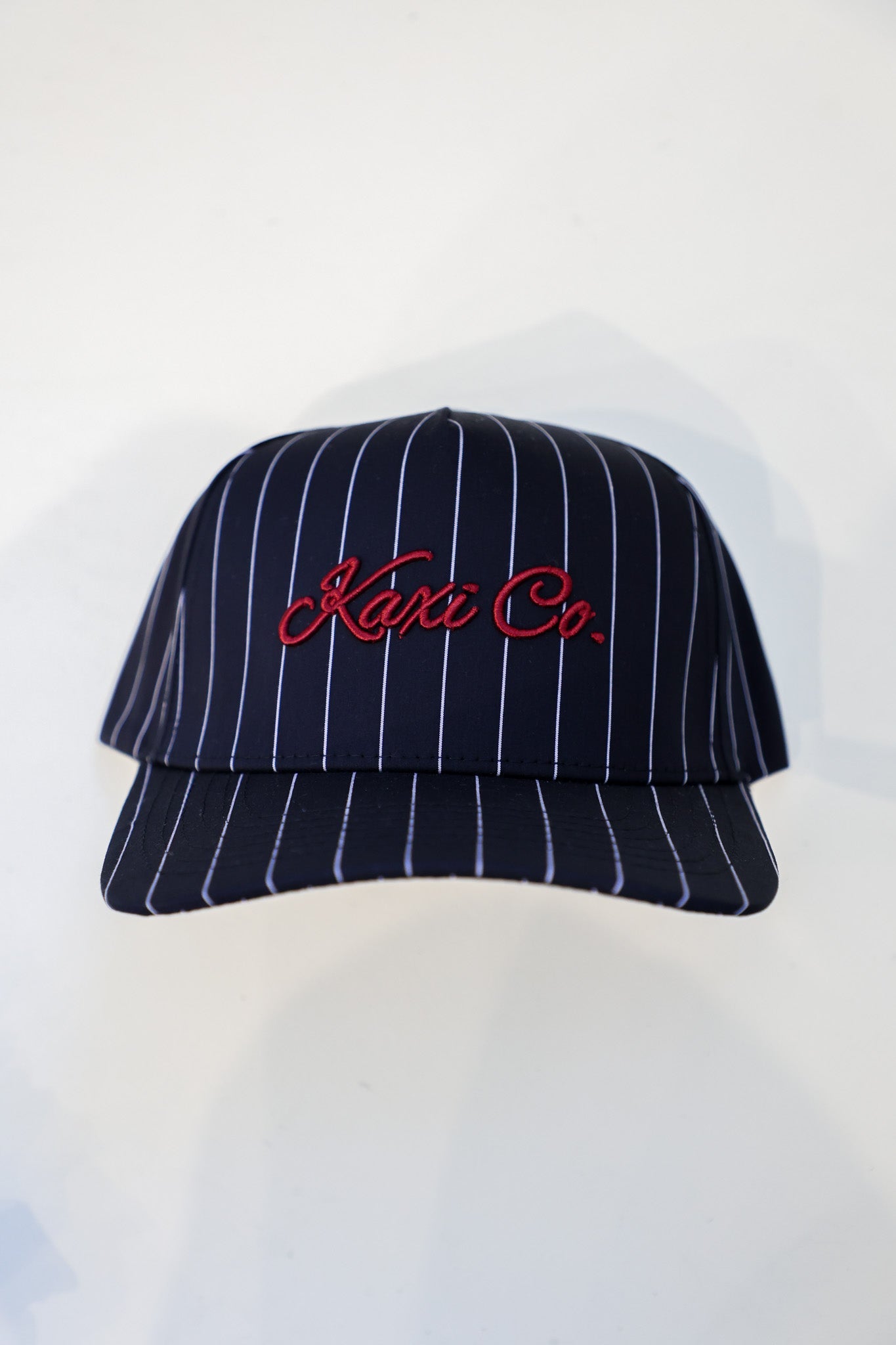 KAXI CO. PIN STRIPED TRUCKER HAT