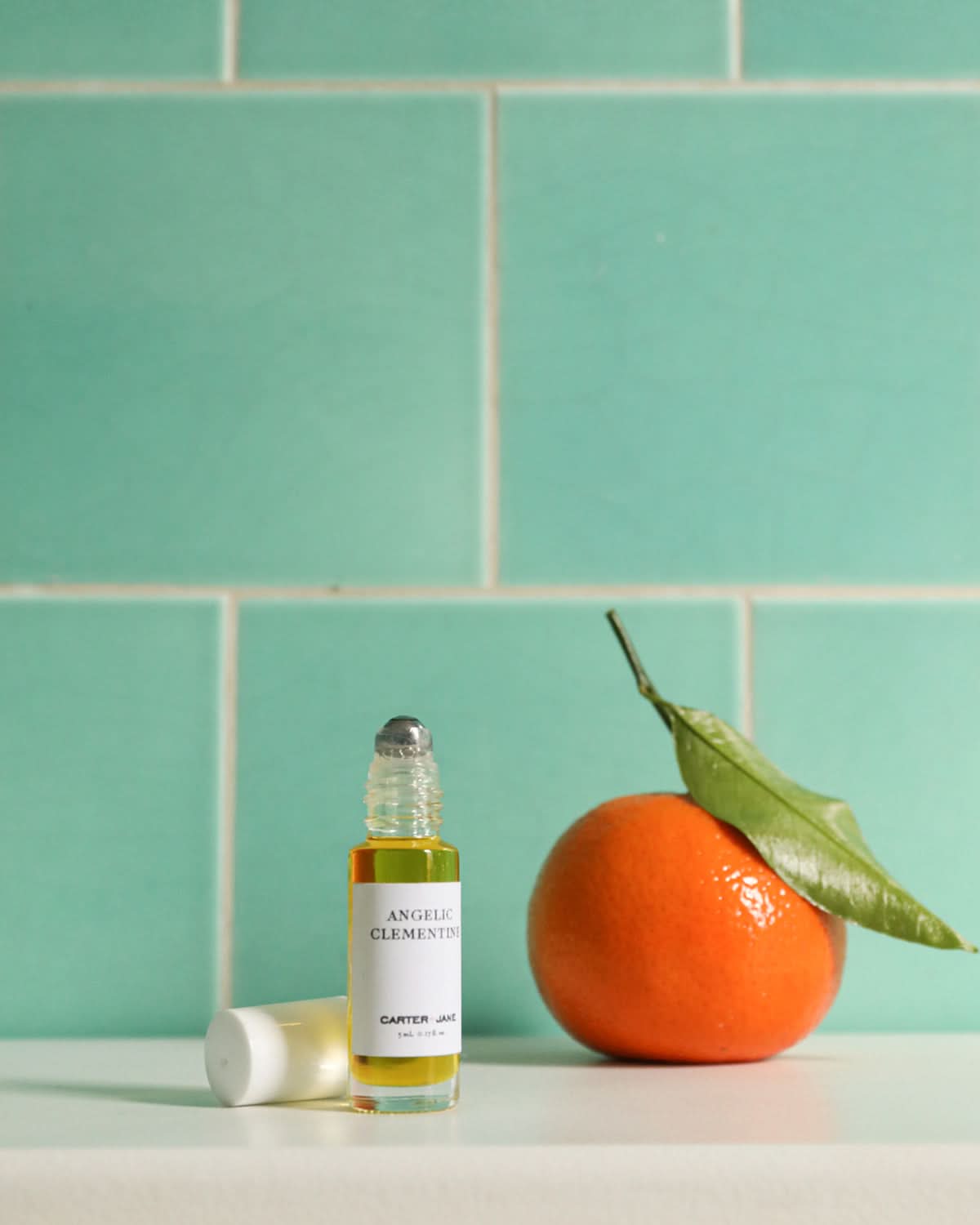 Angelic Clementine Roll - on Aroma Carter + Jane