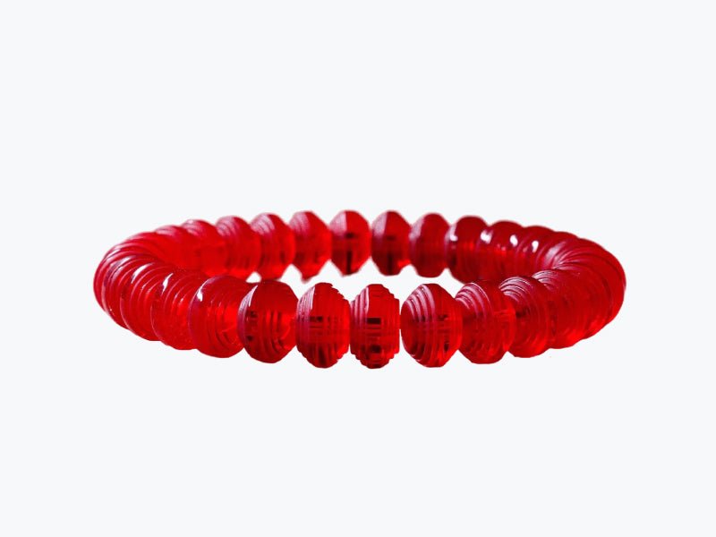 Somavedic Bracelet in red beads with a stretch band on a white background