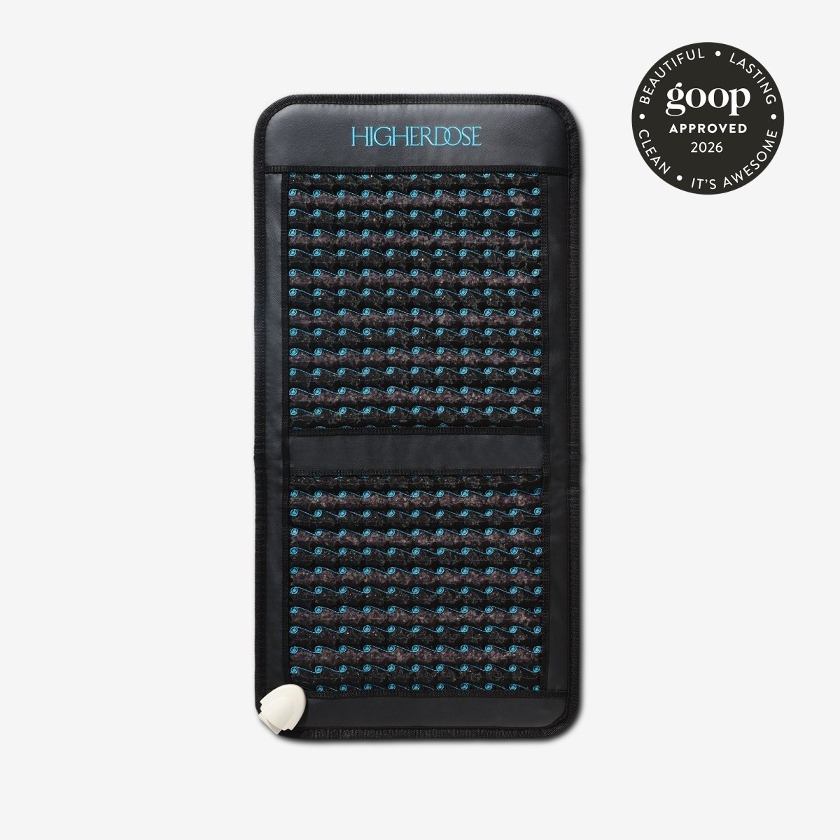 HigherDOSE Infrared PEMF Go Mat folded in black with teal stitching and a goop approved badge