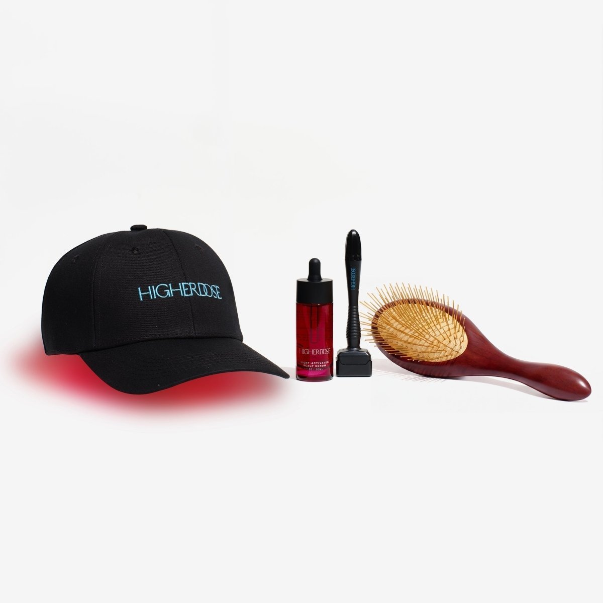 HigherDOSE Red Light Hat with the Hair Serum, derma stamp and wooden brush on white