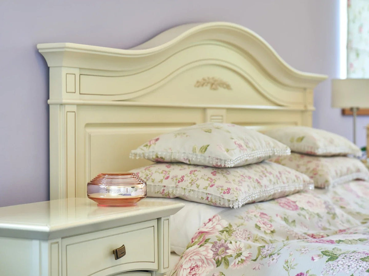 Somavedic Rosalin on a bedside table in a cream bedroom with floral bedding