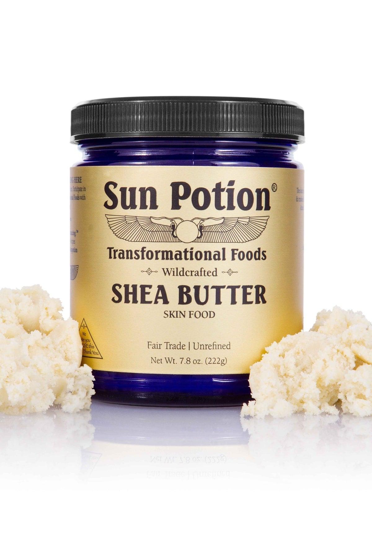 Sun Potion Shea Butter jar among pieces of unrefined shea butter
