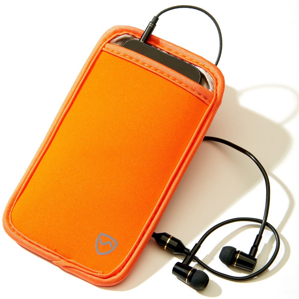 Shield Your Body Phone Pouch in orange holding a phone with earbuds